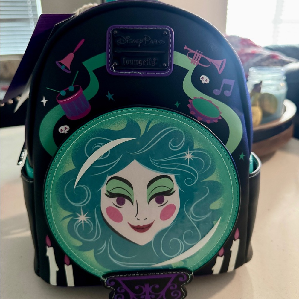 LOUNGEFLY Disney's The Haunted Mansion Madame Leota Mini Backpack
Glow in Dark